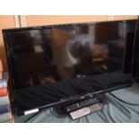 A Logik 31" TV with Remote