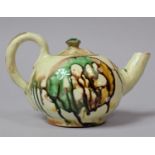 An Early Terracotta Sancai Glazed Teapot, 9.5cm high