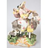 A 19th Century Continental Porcelain Figure Group After The Welch Tailor's Wife Who is Riding Goat