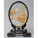 A Mid/Late 20th Century Chinese Cork Diorama Housed in Oval Lacquered Surround on Rectangular Plinth