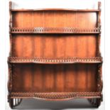 A Reproduction Hard Wood Wall hanging Shelf with Pierced Supports and Galleries to Serpentine Front,