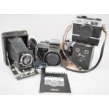 A Collection of Vintage Cameras to Include Kodak, Ricoh 500, Exaktar TL1000 and Brownie Junior