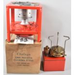 An Oma Paraffin Cooking Stove and a Camping Stove in Tin