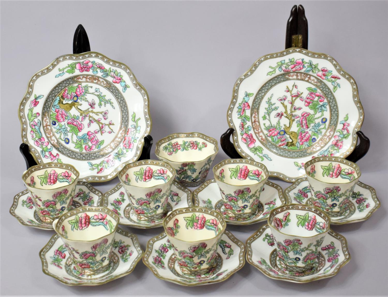 An Indian Tree Coffee Set to comprise Seven Cups, Two Plates, Seven Saucers and a Sugar Bowl
