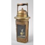 A Vintage Brass Nautical Lamp with Hinged Wooden Handle, by Sherwood's Ltd, 26cm high