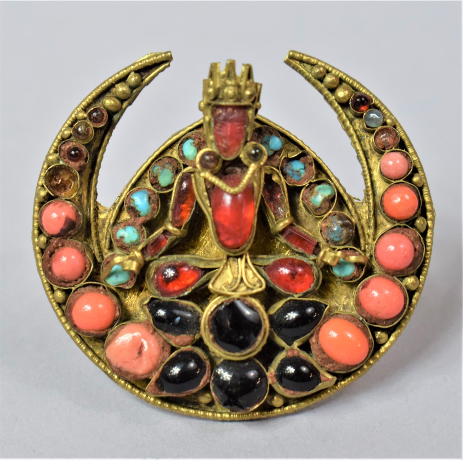 A Large Nepalese/Tibetan Circular Brooch Having Coral, Turquoise and Glass Mounts in the Form of