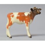 A Beswick Ayrshire Calf