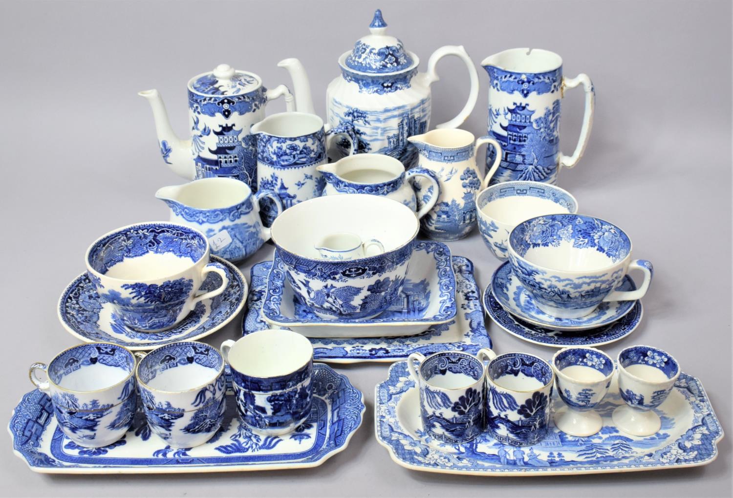 A Collection of Various Blue and White Teawares to comprise Burleigh ware Willow Pattern Hot Water