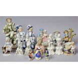 A Collection of Various Continental Bisque and Glazed Figural Ornaments to comprise Cherubs, Salts