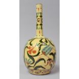 A Persian Glazed Bottle Vase, Decorated with Applied Enamelled Depicting Floral Motif, Chip to