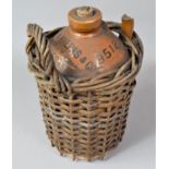 A Stoneware Brewers Bottle for Malpas & Co. in Wicker Carry Surround, Varying Issues to Wicker and