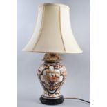 An Oriental Ceramic Table Lamp in the Form of a Vase, With Shade