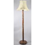 A Mid 20th Century Oriental Carved Standard Lamp with Shade