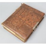 A Late 19th Century Tooled Leather Photo Album Containing Some Family Photographs, Spine and