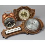 An Edwardian Oak Aneroid Wheel Barometer, 1950's Mantle Clock and a Copper Alarm Clock