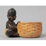 A Mid 20th Century Cast Plaster Novelty Bowl in the Form of Child Beside Basket, 10cm high