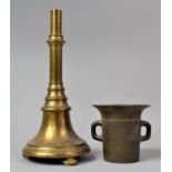 A Brass Two Handled Mortar and a Weighted Brass Table Lamp Base