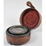 A Late 19th/Early 20th Century Leather Cased Brass Circular Gimballed Pocket Compass, Probably