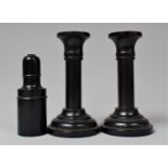 A Pair of Turned Ebony Candlesticks, 13cm high Together with an Ebony Cylindrical Box Containing