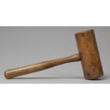 A Wooden Mallet of Cylindrical Form, 31cm Long