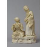 A Mid 20th Century Blanc De Chine Figure Group Depicting Standing Scholar with Scroll and Seated