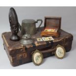 A Vintage Suitcase Containing Wooden Jewellery Box, Teacards, Carved African Wooden Mask, Pewter