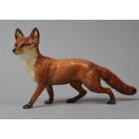 A Beswick Fox, 24cm Long