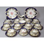 A 19th Century Gilt Cobalt Blue and Floral Decorated Tea Set to Comprise Eleven Cups, Eleven