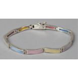 A Silver Eleven Panel Bracelet, Each Mounted With Coloured Mother of Pearl Mounts