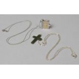 A Silver Pendant in the Form of a Bible, Which Opens to Reveal Psalm 23 Together with a Jade