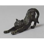 A Bronze Study of a Cat Stretching, 7cm Long