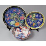 A Japanese Imari Bowl and Two Mid 20th Century Chinese Polychrome Decorated Chargers