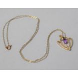 An Edwardian 9ct Gold Pendant Mounted with Amethyst and Seed Pearl on a 9ct Gold Chain, 1.8g Total