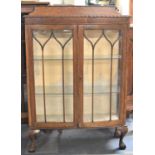 An Edwardian Galleried and Bow Fronted Oak Corner Cabinet on Claw and Ball Supports, 90cm wide