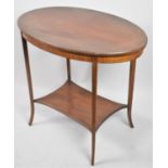 An Edwardian Oval Topped Mahogany Occasional Table with Stretcher Shelf, 75cm wide