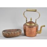 A Copper and Brass Kettle Together with a Copper Mounted Wooden Oval Shallow Bowl, 18cm wide