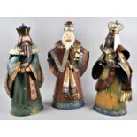 A Set of Three Large Tinplate Christmas Ornaments, Three Kings, Each 56cm high