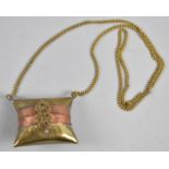 A North African Brass and Copper Banded Novelty Box with Islamic Clasp and Long Chain, 8cm Diameter