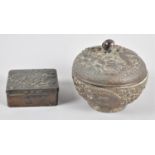 Two Oriental Metal Boxes Decorated in Relief with Chrysanthemums and Dragons, Circular Example