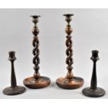 A Tall Pair of Open Barley Twist Oak Candlesticks, 36cm high, Together with a Smaller Pair of Turned