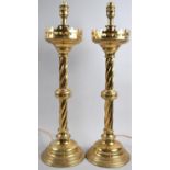 A Pair of Wrythen Stemmed Ecclesiastical Brass Candlesticks Now Converted to Table Lamps, 56cm High