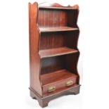 A Reproduction Mahogany Waterfall Bookcase with Base Drawer, 59cm wide and 111cm high