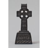 A Carved Irish Bog Oak Celtic Cross, 12cm high