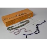 A Small Collection of Costume Jewellery Necklaces in Padded Box