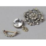 Two Silver Framed Brooches and a Silver Mounted Crystal