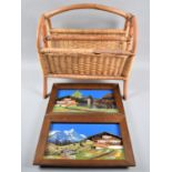 A Bamboo Framed Framed Two Division Magazine Rack and Pair of Souvenir Swiss Scenic Pictures