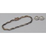 A Silver Jewelled and Articulated Bracelet Together with a Pair of Silver and CZ Pierced Spherical