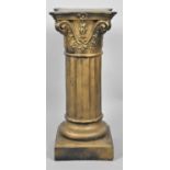 A Gilt Sprayed Resin Torchere Stand in the Form of a Ribbed Corinthian Column Top on Square Base,