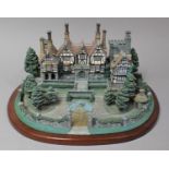 A Danbury Mint English Manor House on Wooden Plinth