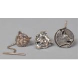 A Silver and Lion Mask Lapel Pin with Safety Chain and Two Silver Pendants, Tiger and Wolf